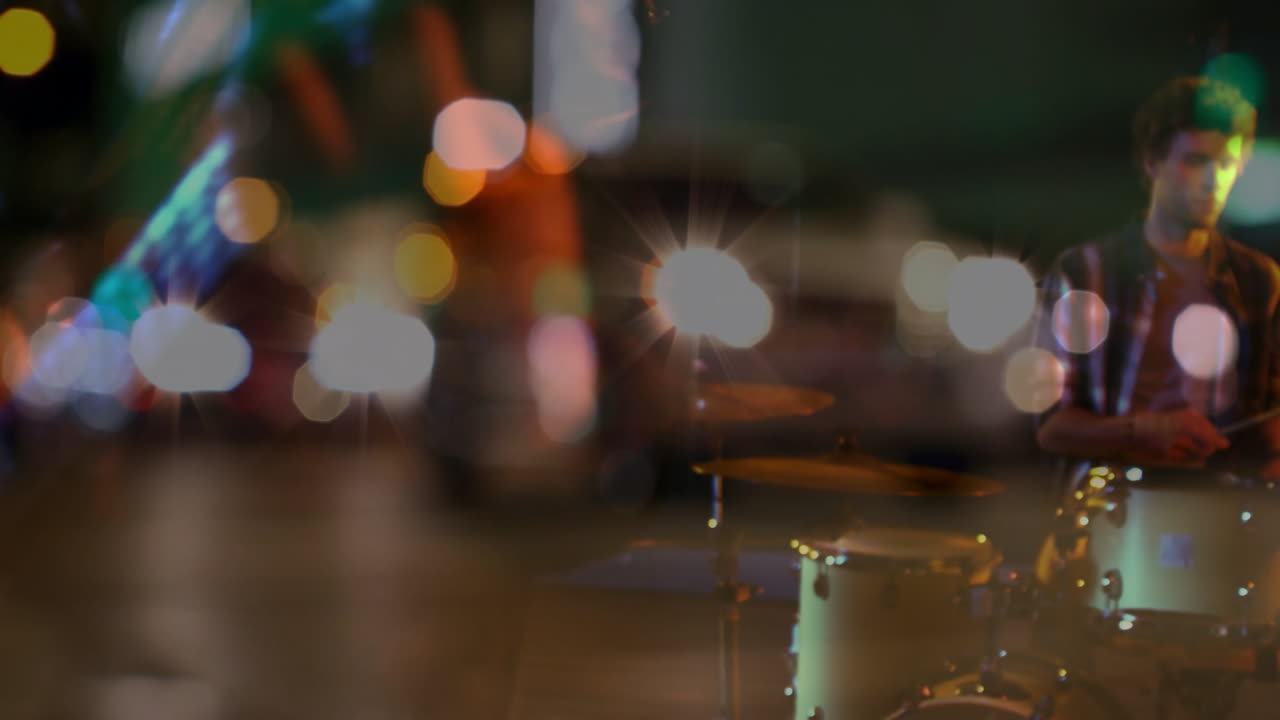 drummer performing on city street, streaming animated sound waves over drums for technology
