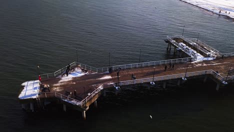 Gdansk-Brzezno-pier-in-winter,-aerial-shot