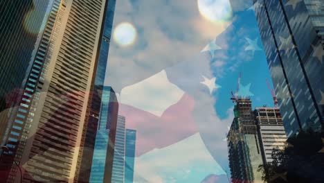 animation of usa waving flag and candles over cityscape