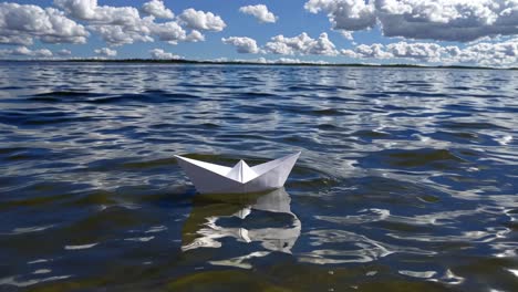 paper boat on a lake