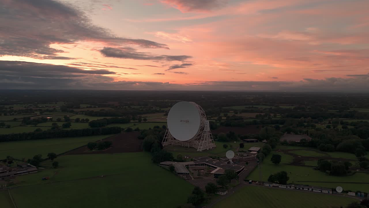 Aerial shot of the Lovell Telescope at Jodrell Bank Observatory during sunset
