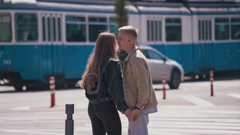 happy young couple outdoors. girlfriend with boyfriend having fun in the city street with smiling face. young woman and man enjoying together in the city.