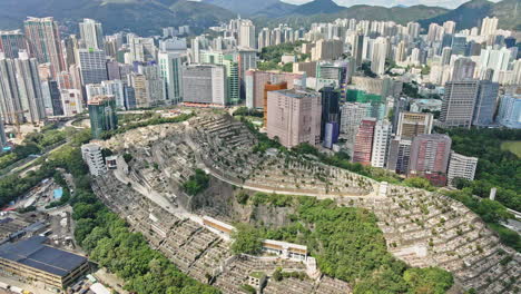 drone shot of tsuen wan chinese permanent cemetery in hong kong