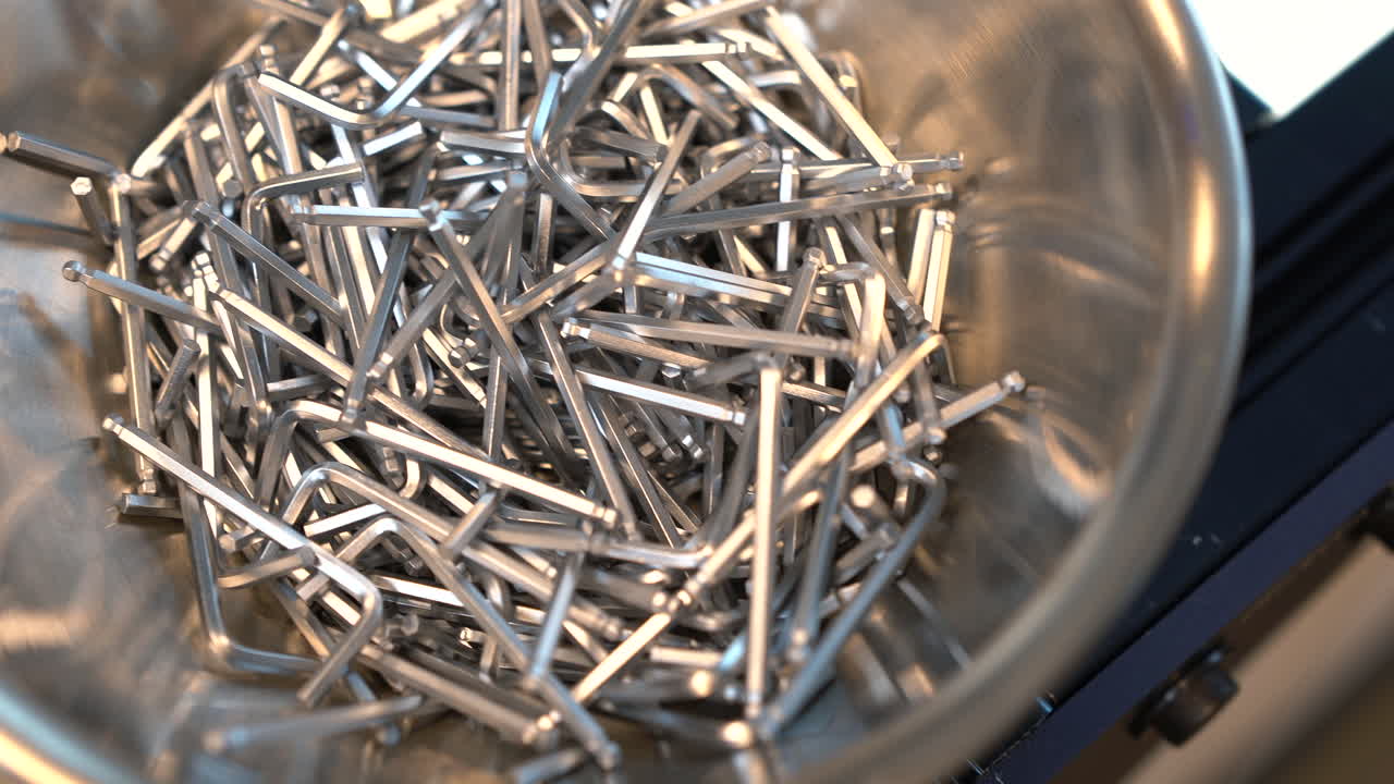 Allen keys in a metal bowl in a factory