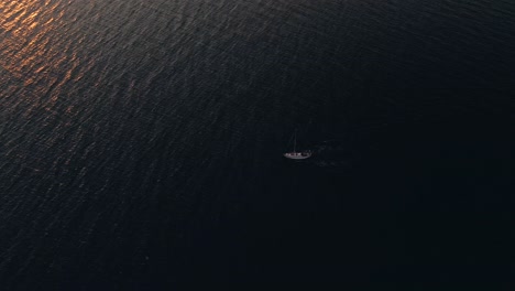 white sailboat travelling on the open water of saint lawrence in quebec, canada