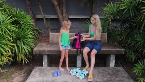 mother and daughter getting ready for outdoor activity