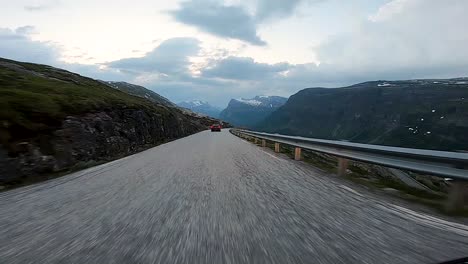 a scenic drive through the norwegian countryside following another vehicle