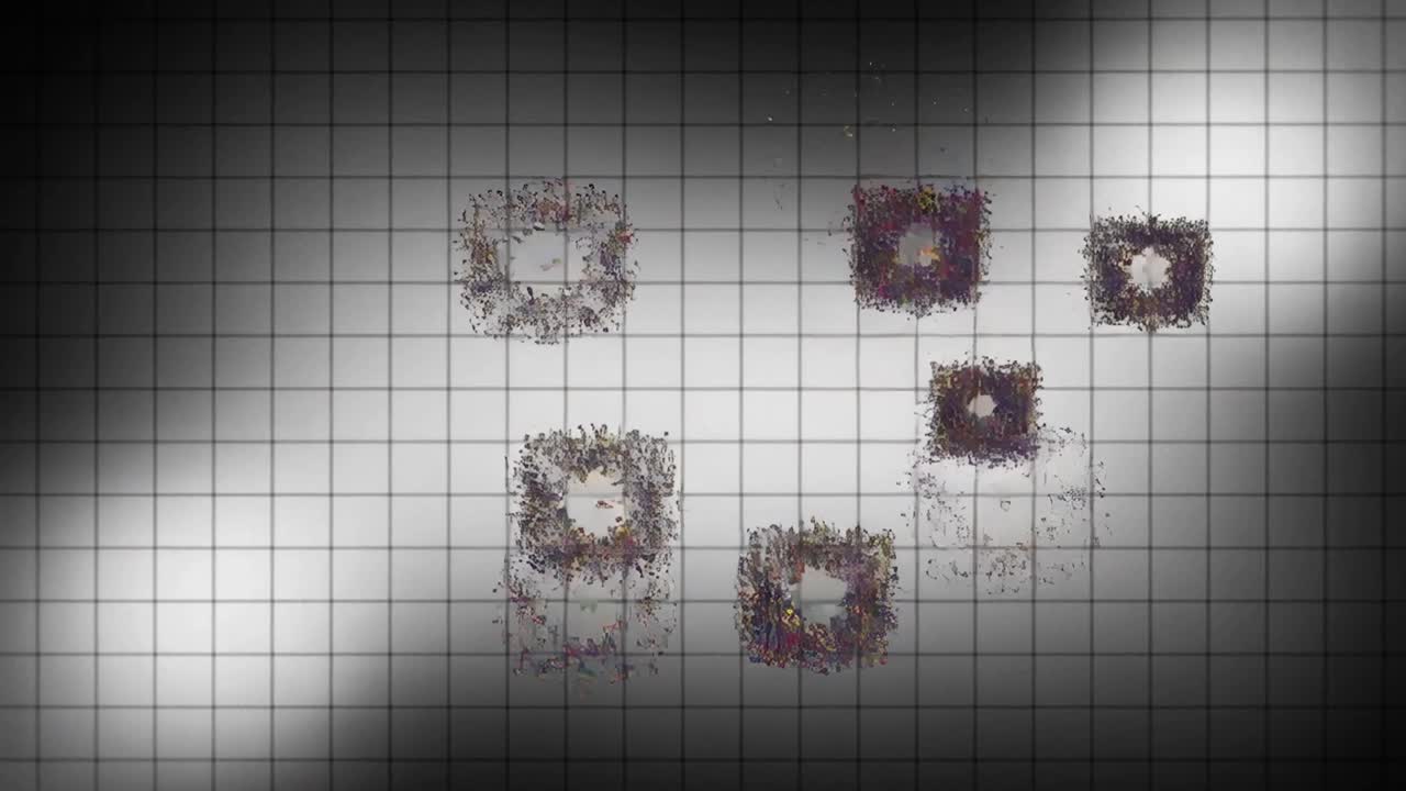 Ring fragmenting, clusters scattering and forming wider rings on white grid to show dispersion