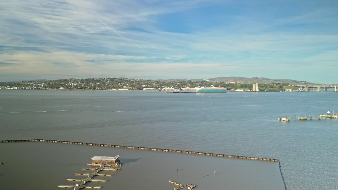 Drone views from Martinez capture Benicia’s scenic shore and the iconic Benicia-Martinez Bridge, with its elegant structure spanning the sparkling waters of the Carquinez Strait.