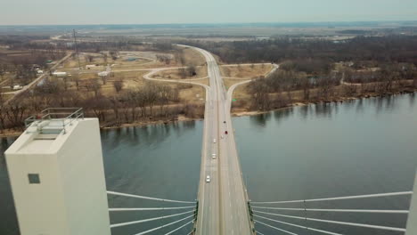 aerial of a suspension bridge crossing the mississippi river near burlington iowa suggests american infrastructure 8