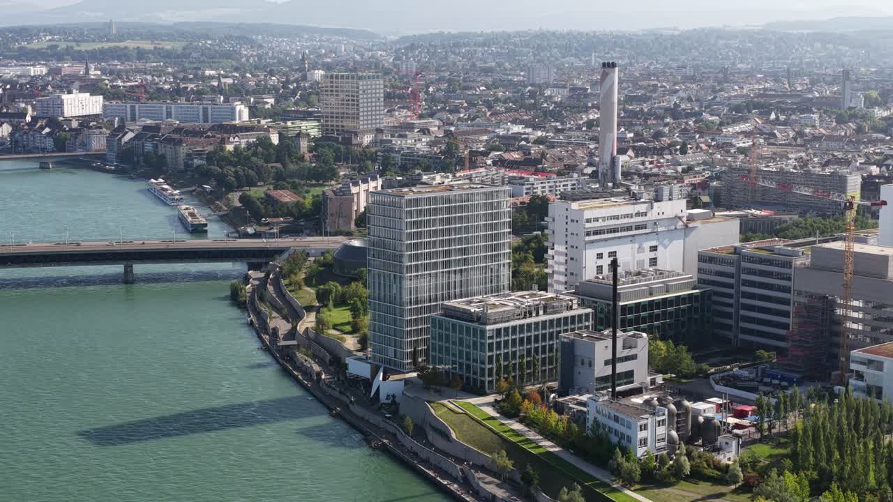 The Novartis Campus in Basel, Switzerland, focusing on life sciences, pharmaceutical innovation, and corporate architecture, aerial drone video
