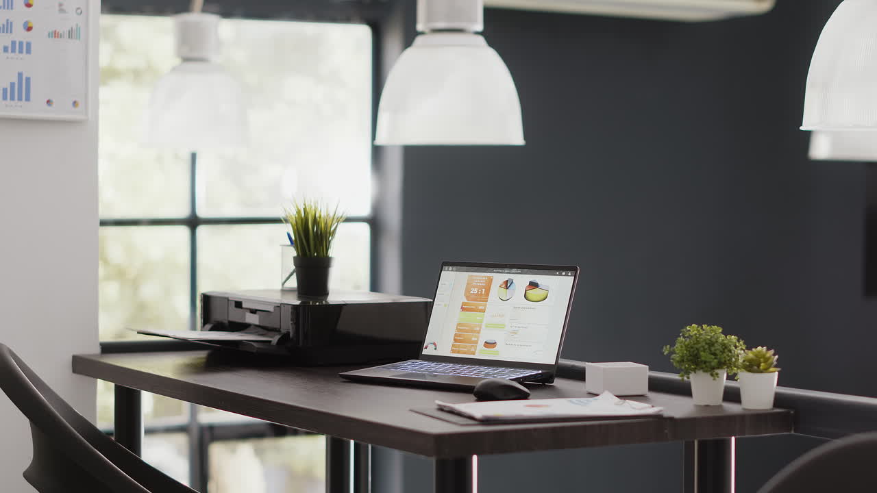 Modern Home Office Setup with Laptop and Printer