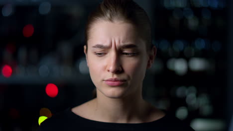 portrait of serious girl thinking thoughtful outdoors. beautiful young woman.