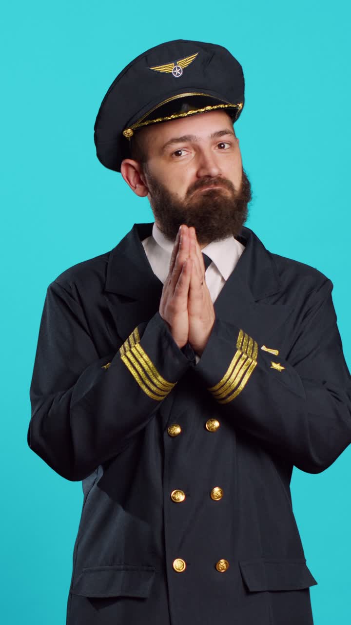 Vertical video: Confused plane aviator acting shocked and surprised