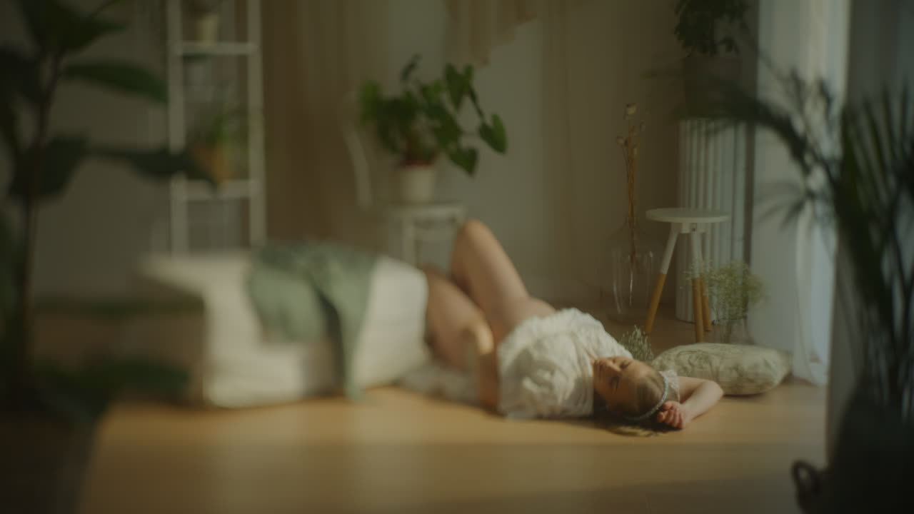 Sensual Portrait of Pregnant Woman on Floor