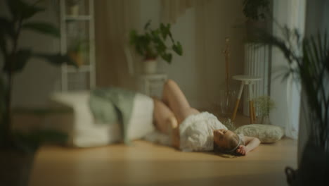 sensual portrait of pregnant woman on floor