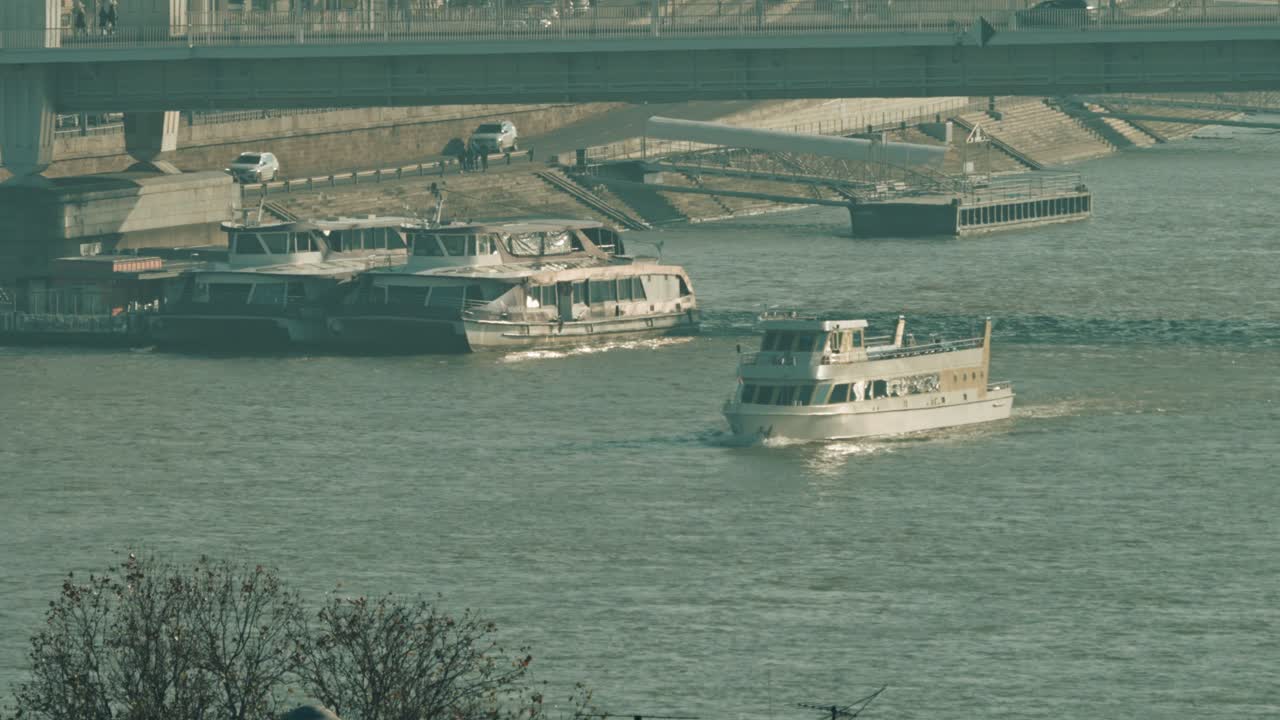 Ship driving on the Danube through Sz&eacute;chenyi Chain Bridge