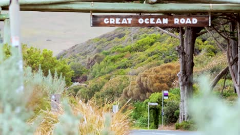 iconic road sign amidst lush greenery and hills