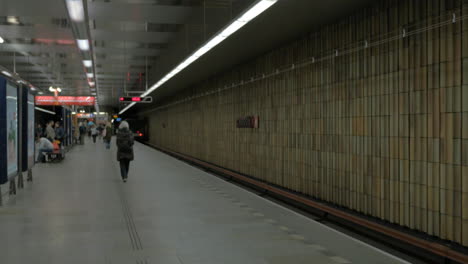 view of moving away subway train on the station prague czech republic