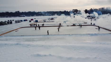 snow and hockey on lake