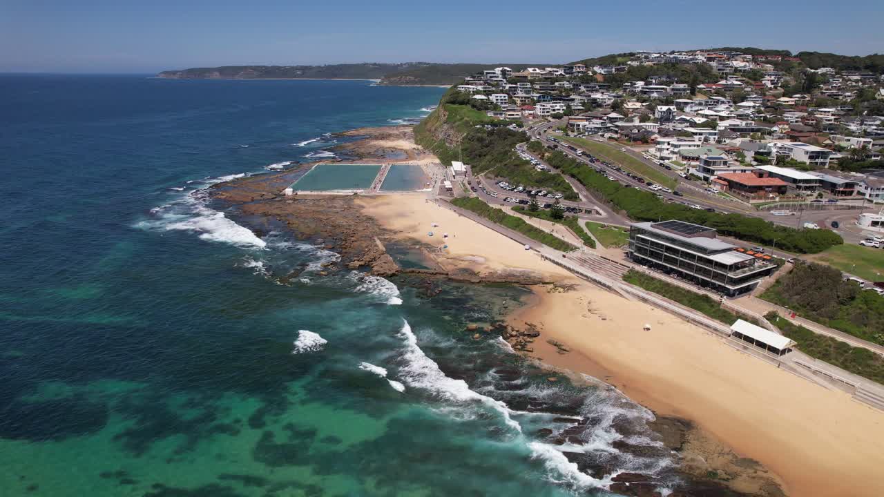 Merewether Ocean Baths With View Of Tasman Sea In Newcastle, NSW, Australia. aerial shot