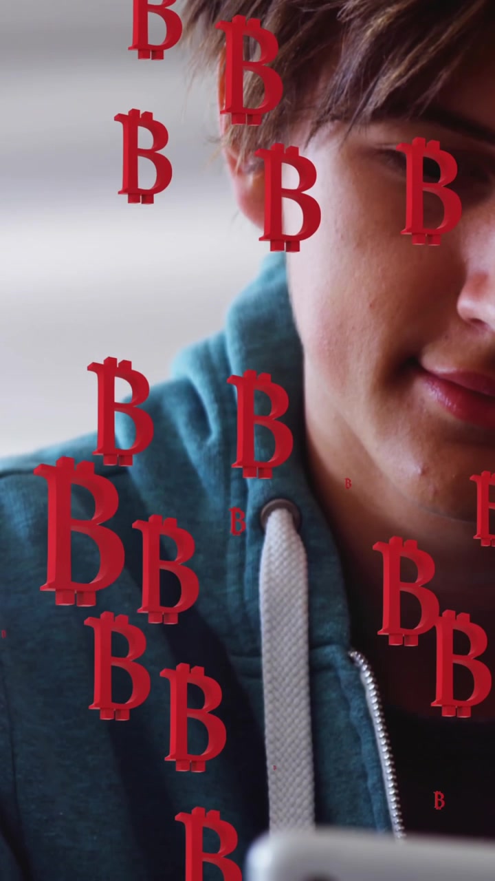Animation of bitcoins over caucasian man using tablet
