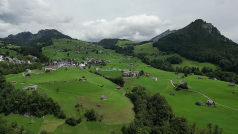 Aerial-view-of-beautiful-fairytale-like-Alpine-landscape-of-Switzerland