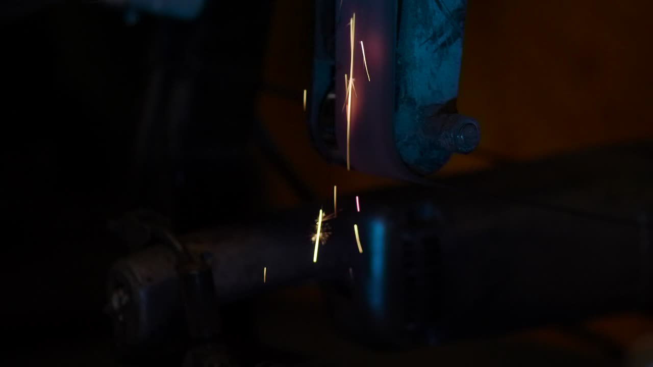 Flying a lot of sparks. Close-up