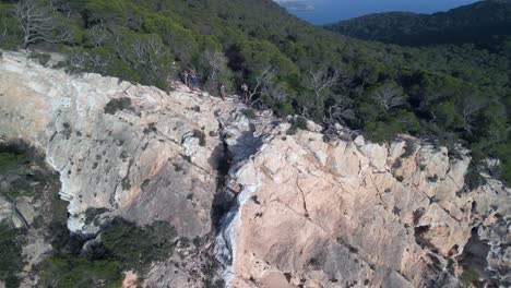 group of hikers on the cliff