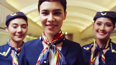 cabin crew or air hostess working in airplane