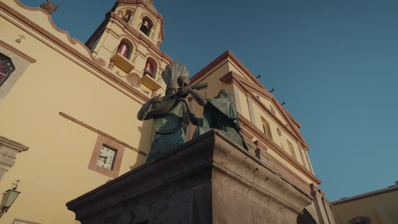 Statue in front of a church