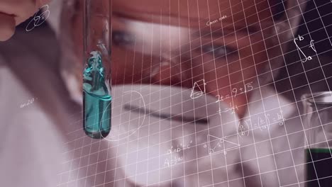 científico que estudia una sustancia química en un tubo de ensayo