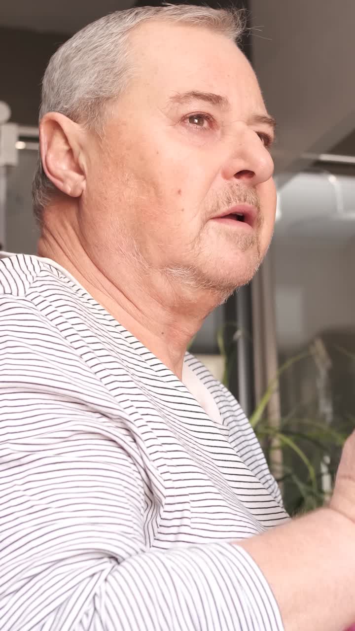 Gay men brushing their teeth and cleaning the face in the bathroom after waking up