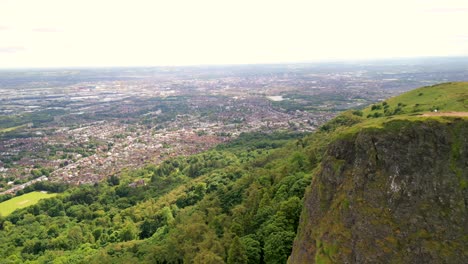 Aerial-shot-of-Cavehill-in-North-Belfast,-NI-on-a-sunny-day