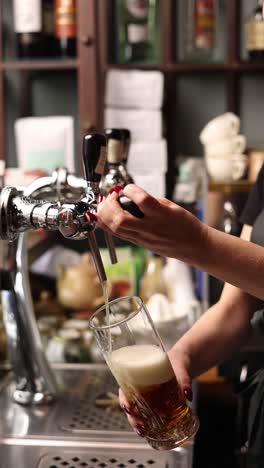 bartender pouring beer