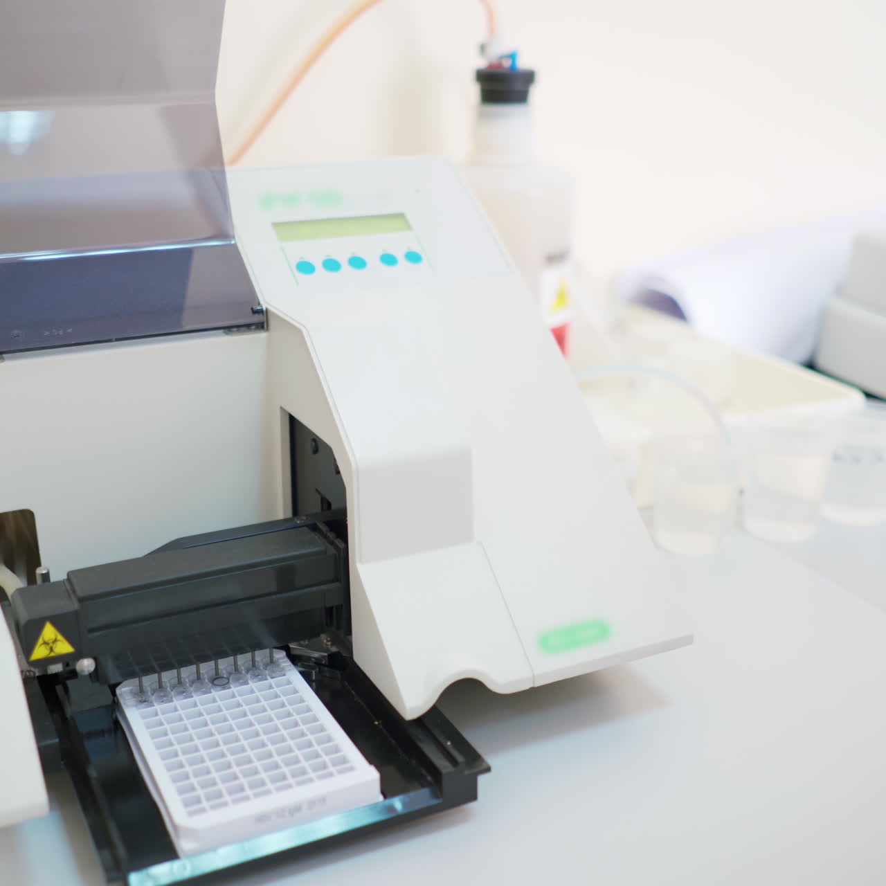 Medical device at work in lab. Automated machine for testing various samples in modern clinic. Laboratory equipment.