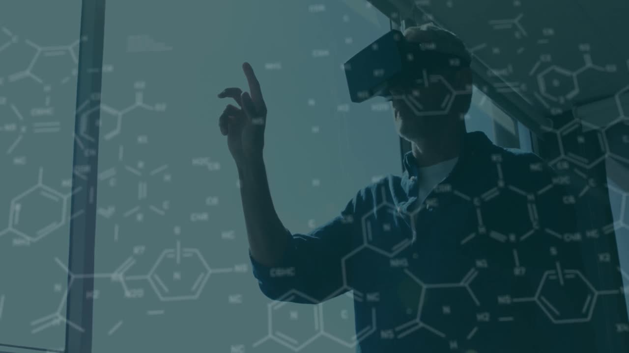 Animation of chemical formulas over biracial men using vr headset