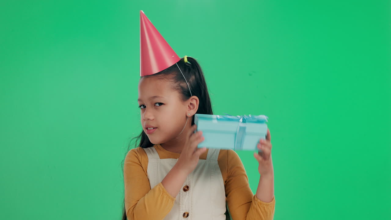 A little girl with a birthday gift