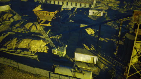 industrial landscape showcasing machinery and structures at a mining site