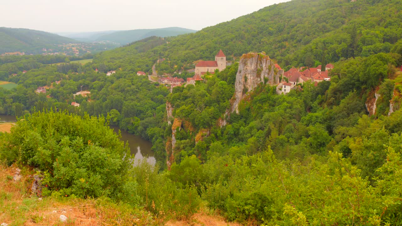 Hilltop Village Of Saint-Cirq-Lapopie In South-western France. Aerial Wide Shot