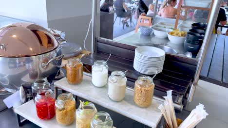 food jars and dishes arranged for buffet service