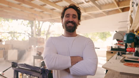 wood, arms crossed and face of man in workshop