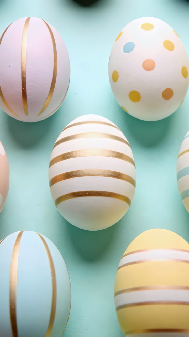 Camera moving up over 3x3 egg grid on mint backdrop, revealing pastel patterns for product design