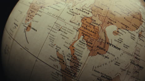 close-up of a globe focusing on southeast asia