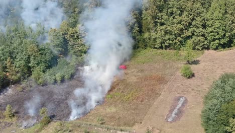 smoke and fire on a meadow