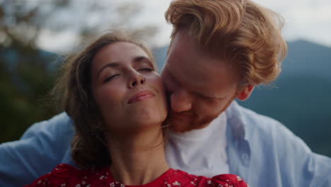 Just-married-couple-kissing-in-mountains.-Tender-lovers-enjoying-family-vacation