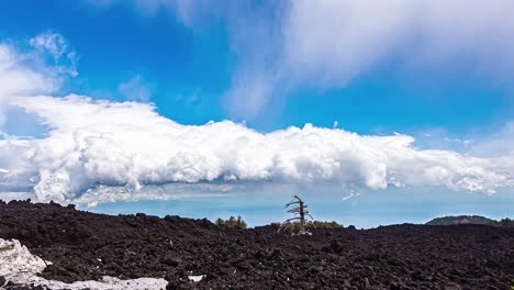 White-Fluffy-Clouds-Rolling-Over-Landscape-Of-Mount-Etna-In-Catania,-Italy