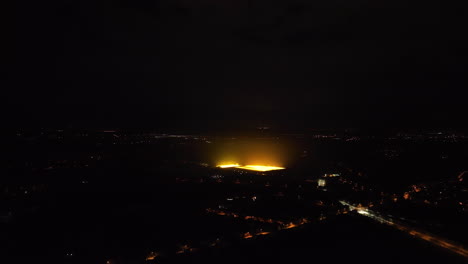 aerial view of illuminated stadium at night