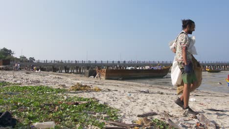 Time-lapse-of-a-beach-cleanup-organised-by-volunteers-on-a-remote-island-between-India-and-South-East-Asia-called-Neil-Island,-located-amongst-the-Andaman-and-Nicobar-Islands