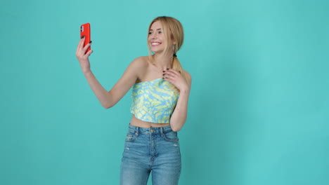 young woman taking selfie